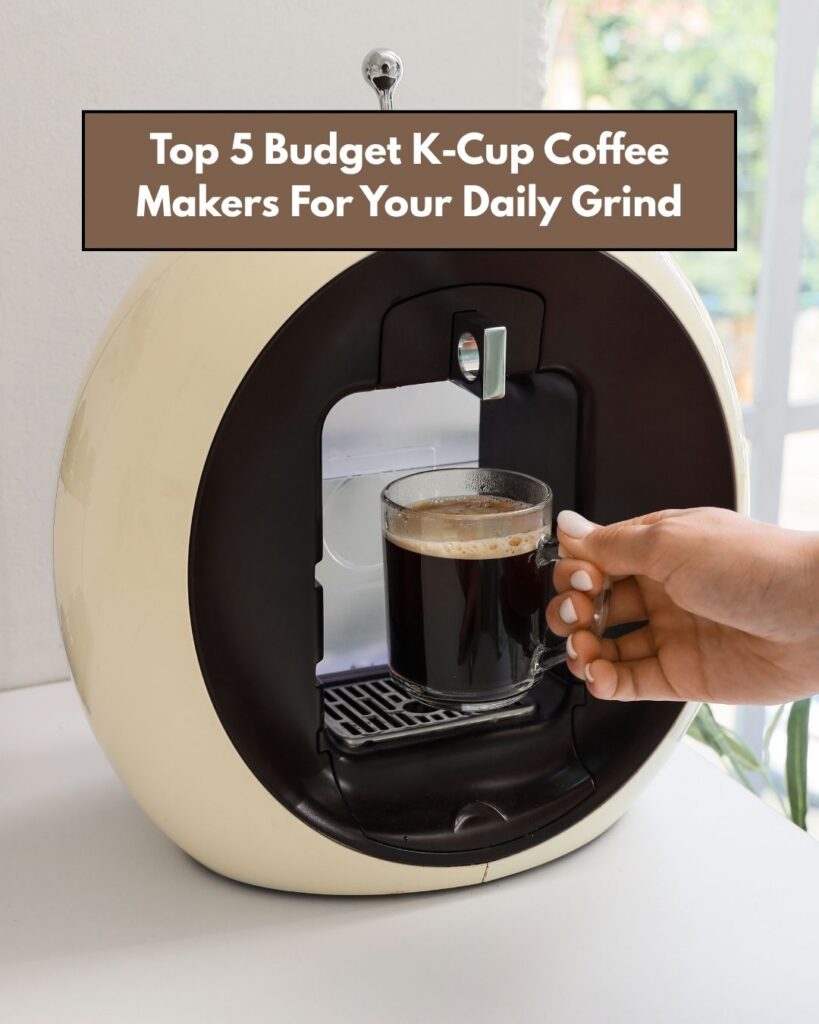 A hand holding a mug with coffee that's perched on a K-Cup Coffee Maker.