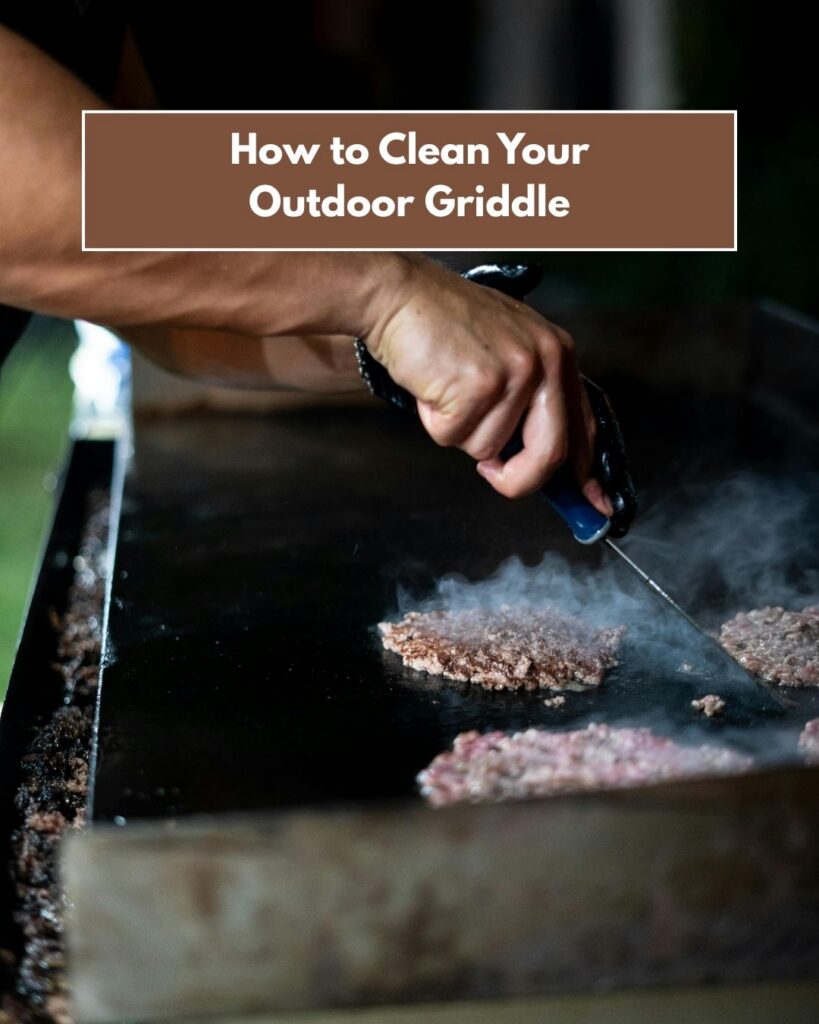 A person about to flip a burger patty on a griddle.