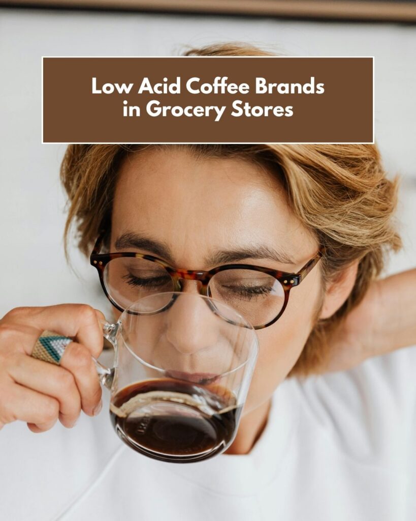A woman drink black coffee from a clear mug.