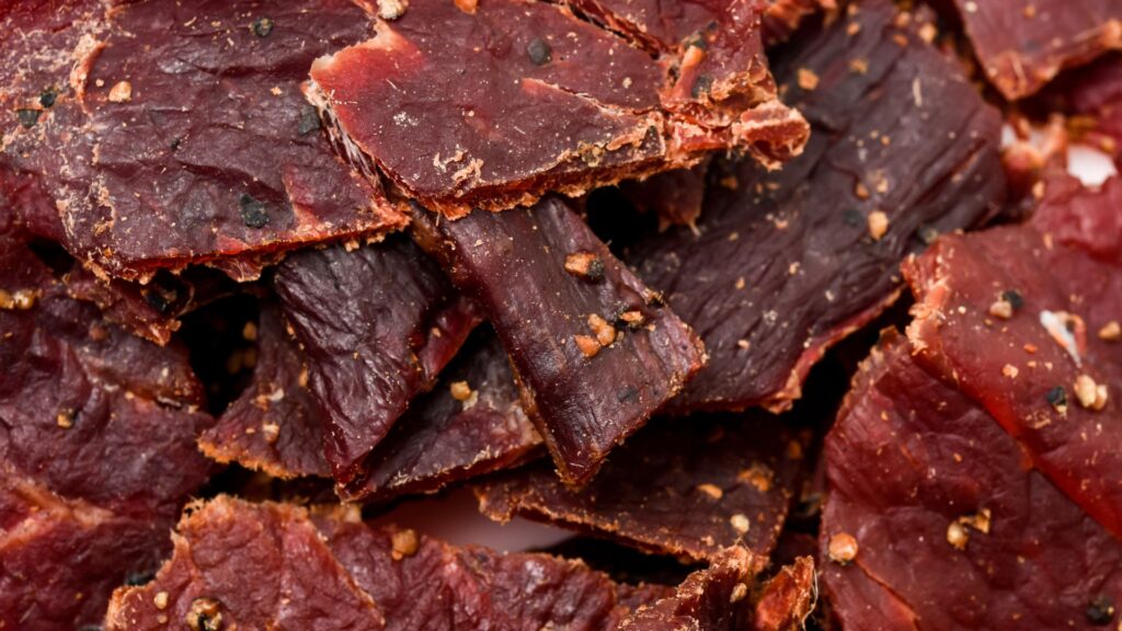 Closeup shot of a pile of jerky.