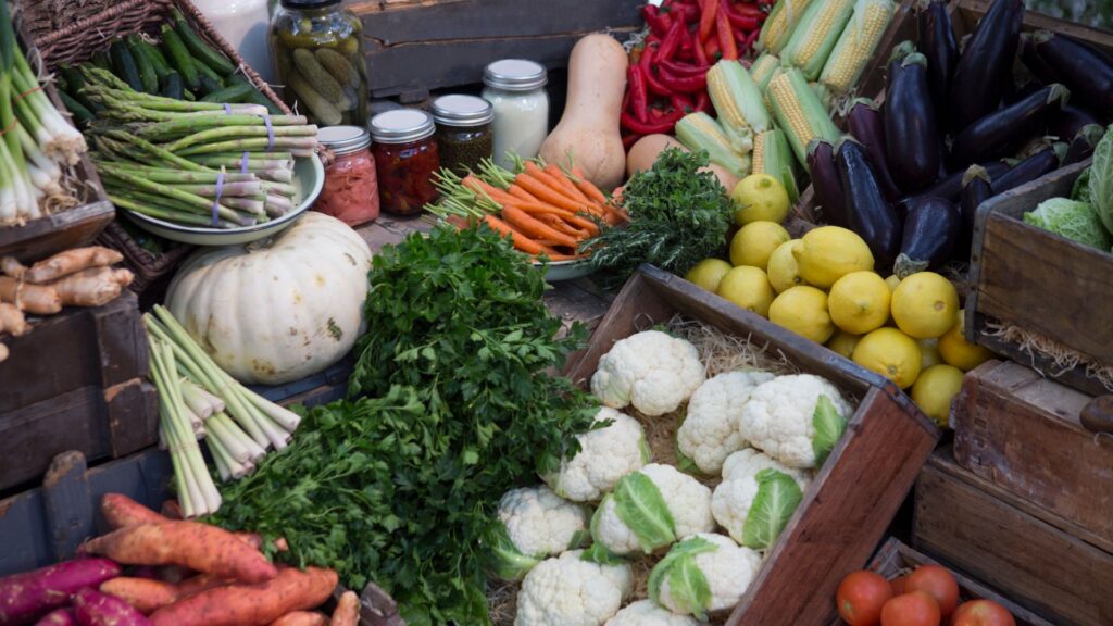 Fresh produce in crates that are perfect for fall.