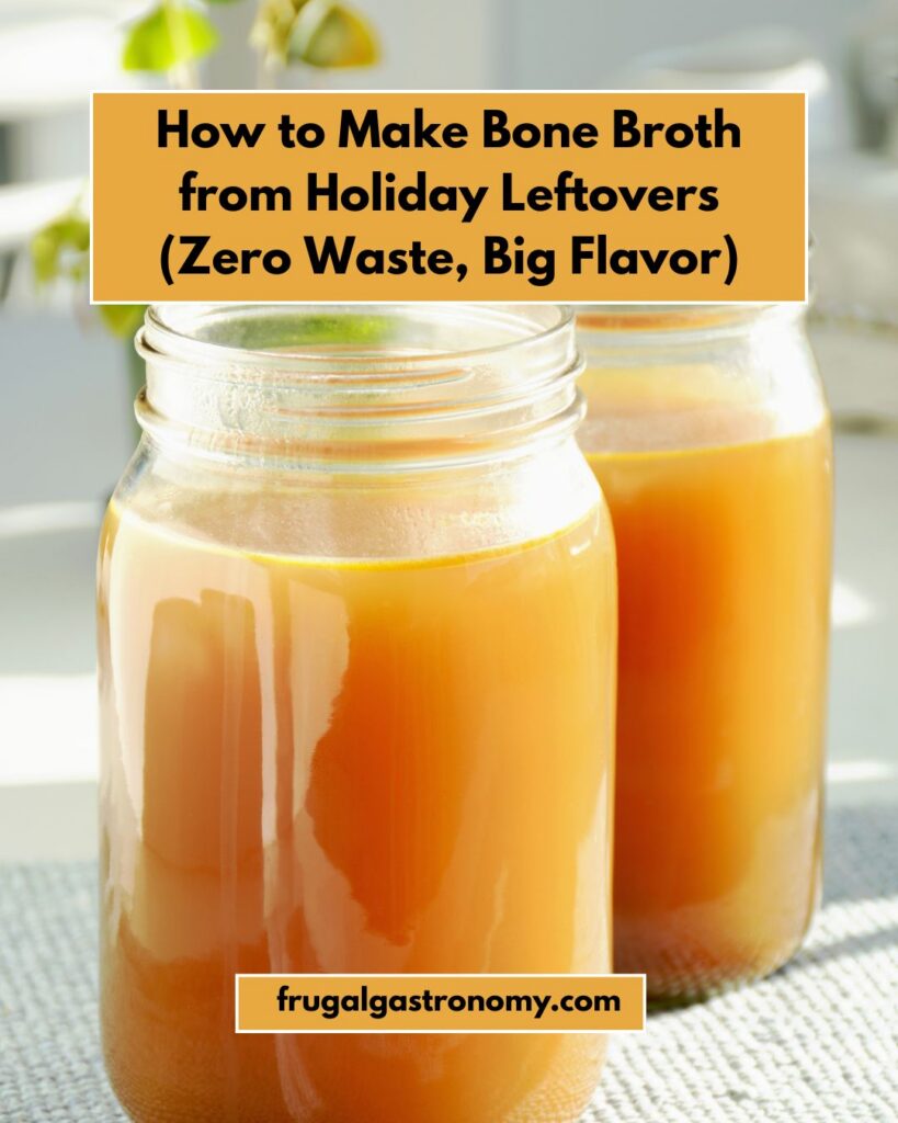 Two tall jars of bone broth on a white surface.