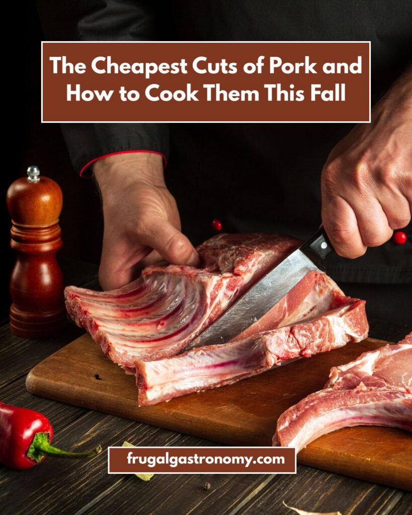 A person chopping pork ribs on a wooden chopping board.
