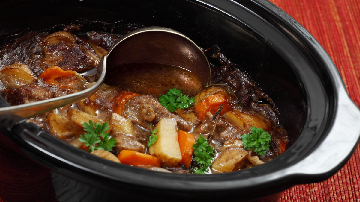 Beef Stew simmering in a slow cooker.