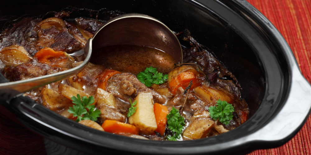 Beef Stew simmering in a slow cooker.